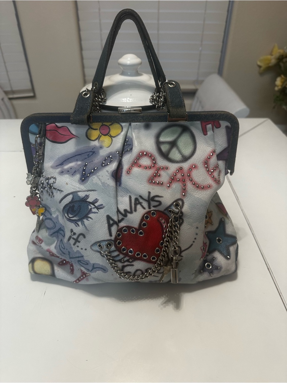 Isabella Fiore edgy cool bag white with blue trim added graffiti